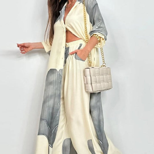Elegantes und sinnliches Set aus langem Blusen-Shirt mit Druck und weiter Hose