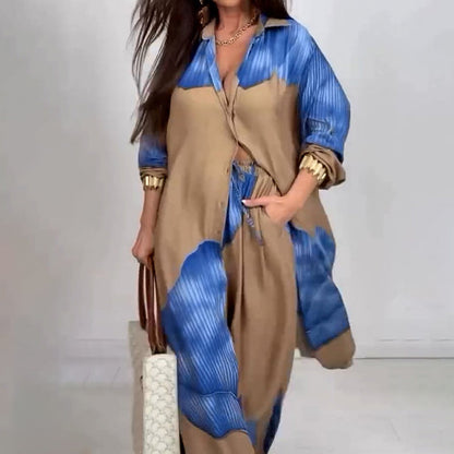 Elegantes und sinnliches Set aus langem Blusen-Shirt mit Druck und weiter Hose